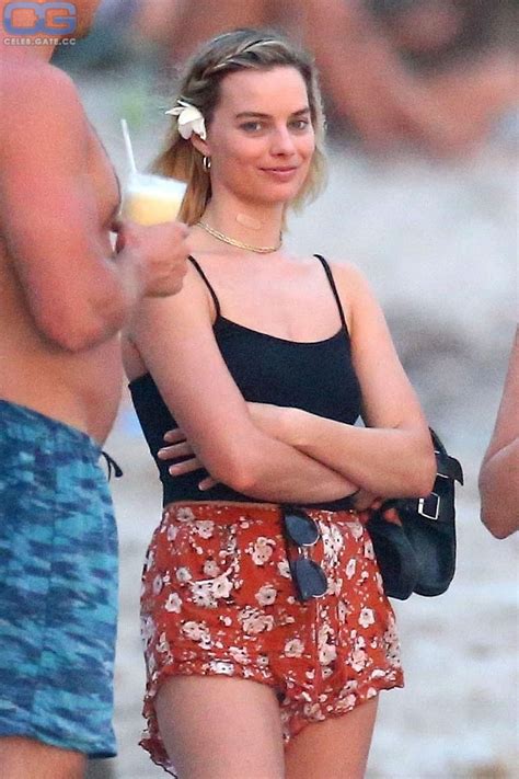 margot robbie sexy images|Margot Robbie strips down to her bikini for wild 4th of。